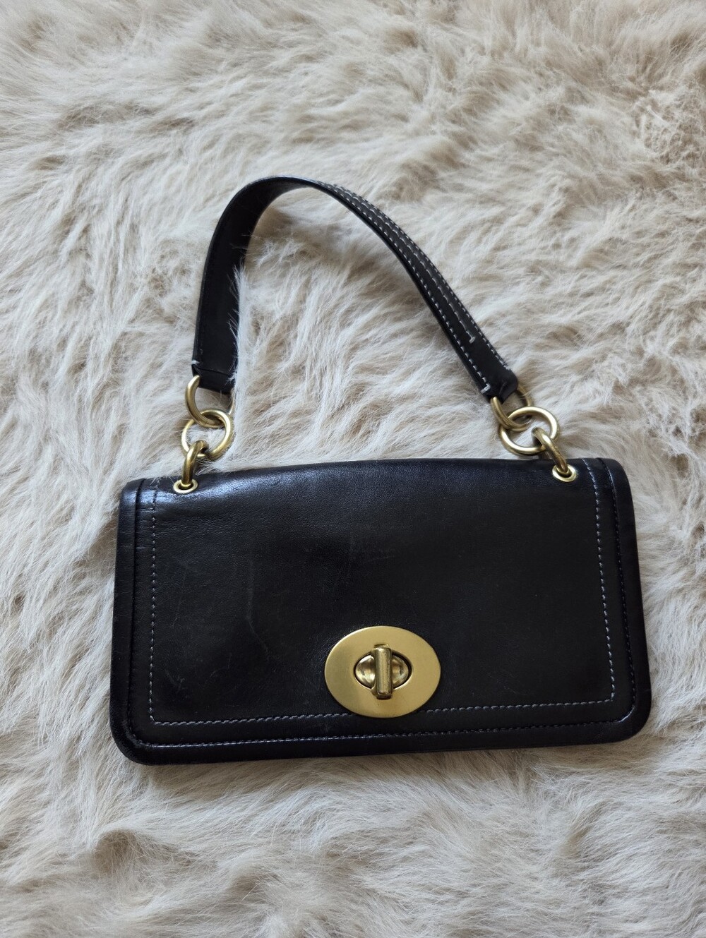 Coach Black Leather Shoulder Bag with Gold-Tone Hardware